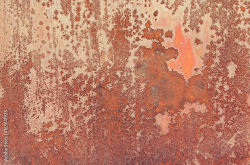Texture of red rust on metal © saikorn