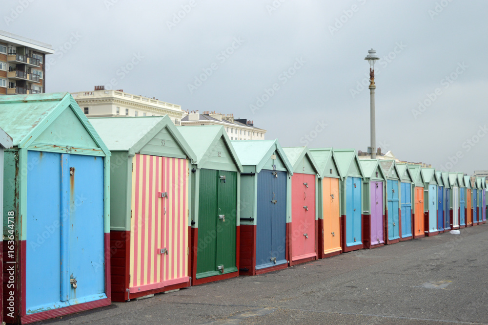 Naklejka premium Rainbow Coloured Beach Sheds 