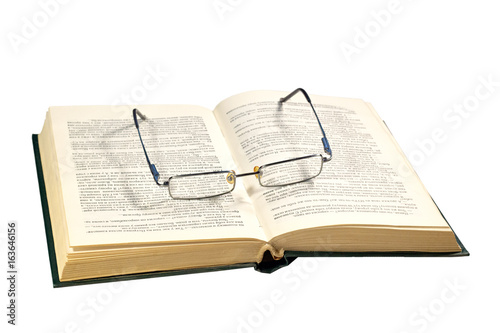 books and glasses isilated on white background