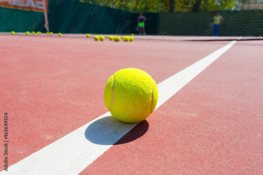 Tennis Balls on the Court