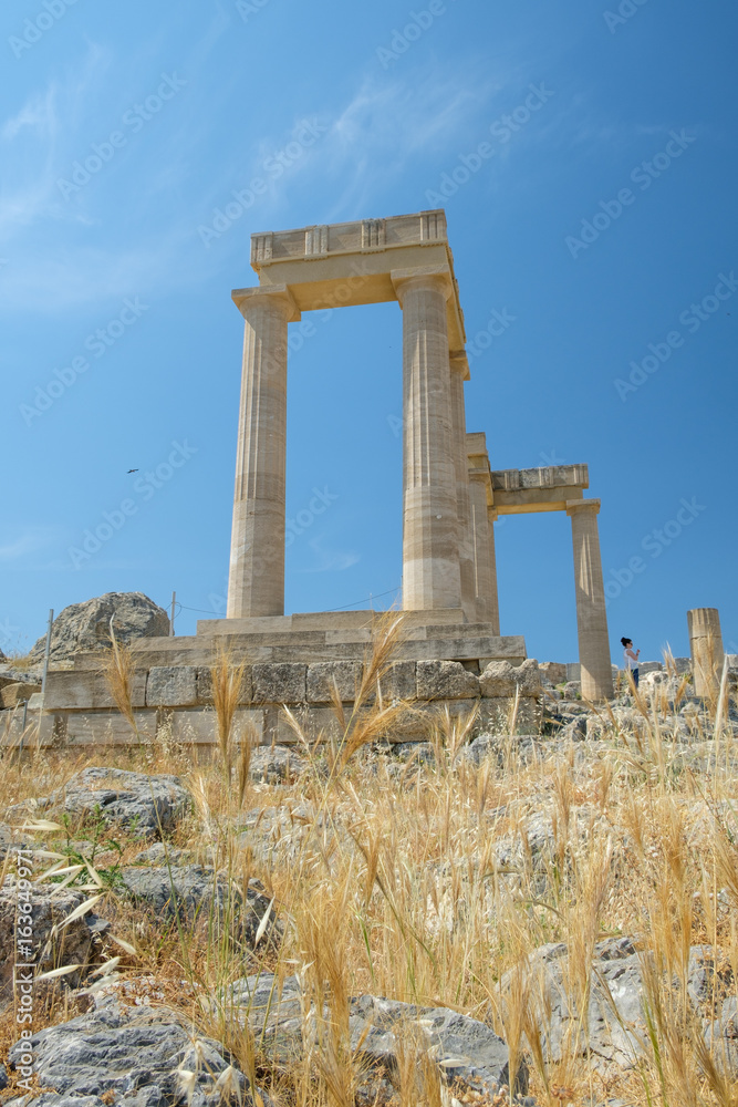 Ruins of an ancient Greek temple of Athena Lindia on Lindos Acropolis. Dodecanese Islands, Greek Islands, Greece, Europe