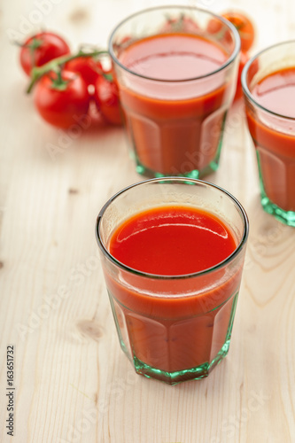 Tomato juice and fresh tomatoes