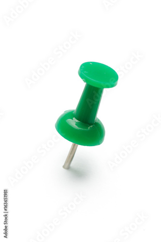 close up of a pushpin on white background