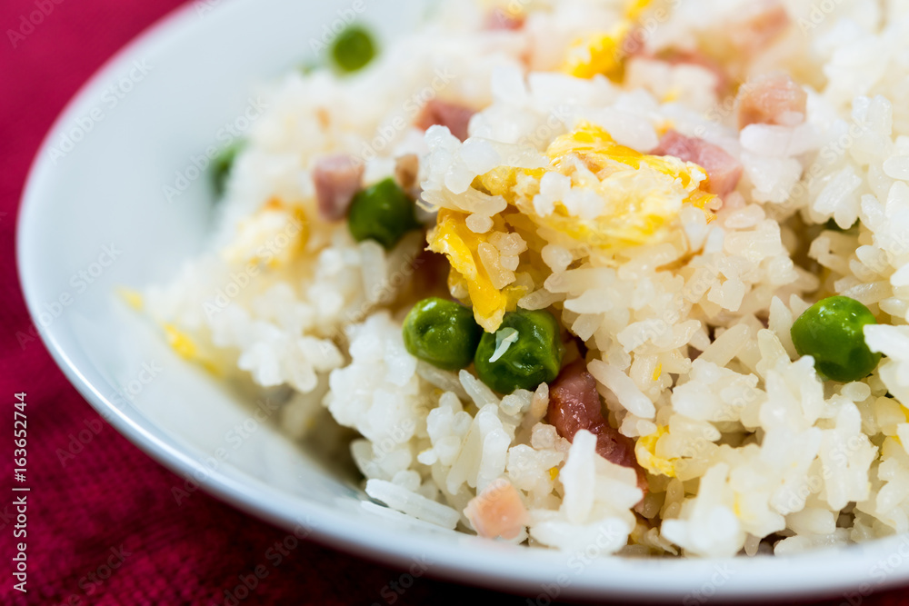 Homemade Chinese fried rice with vegetables and fried eggs Homemade Chinese fried rice with vegetables and fried eggs