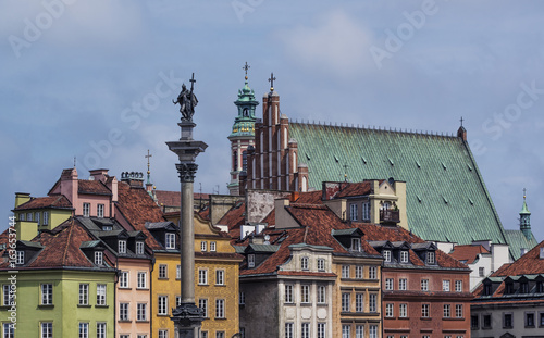 Sigismund's Column in Warsaw, Poland and Old Town rooftops