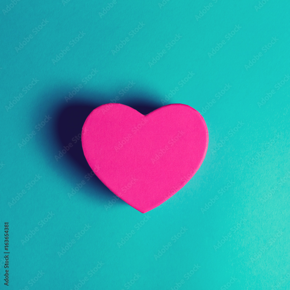 Heart shaped gift box on a blue background