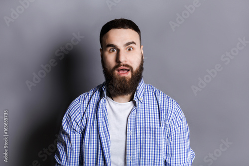 Shocked bearded man portrait