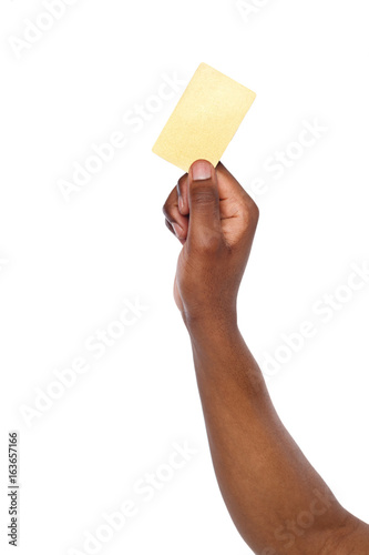 Close-up of male hand holding blank plastic card