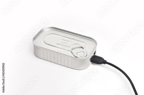 Unusual tin-shaped external hard disk on a white background