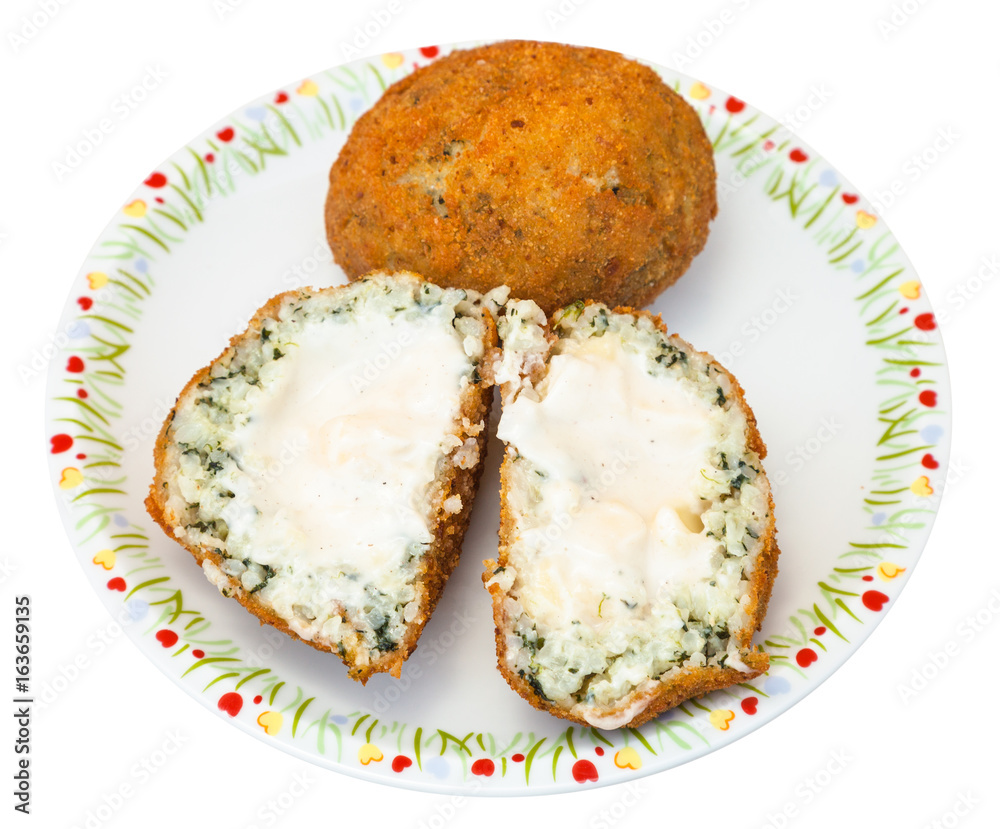 spinach stuffed rice balls arancini on plate