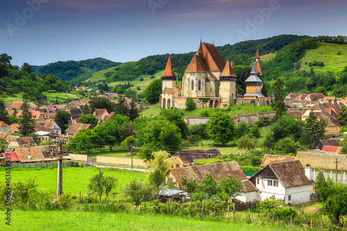 Famous Transylvanian touristic village with saxon fortified church, Biertan, Romania photo