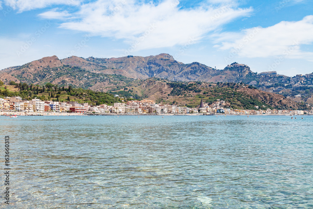 Ionian sea and view of Giardini Naxos town
