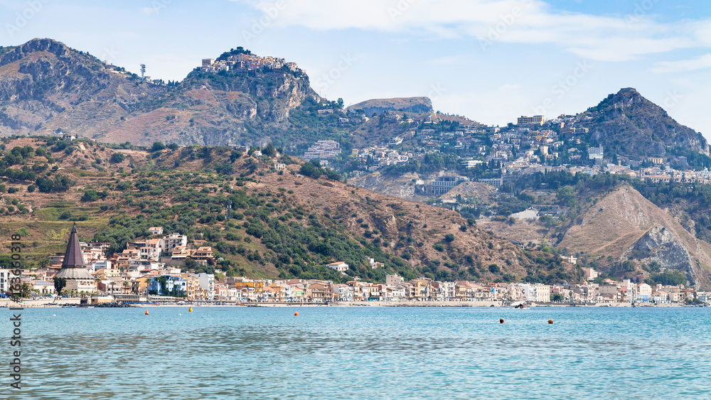 Giardini Naxos town and Taormina city on cape