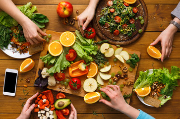 Dinner table, women eat healthy food at home kitchen