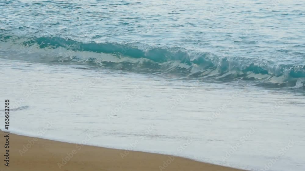 Waves on a sandy beach Waves on a sandy beach