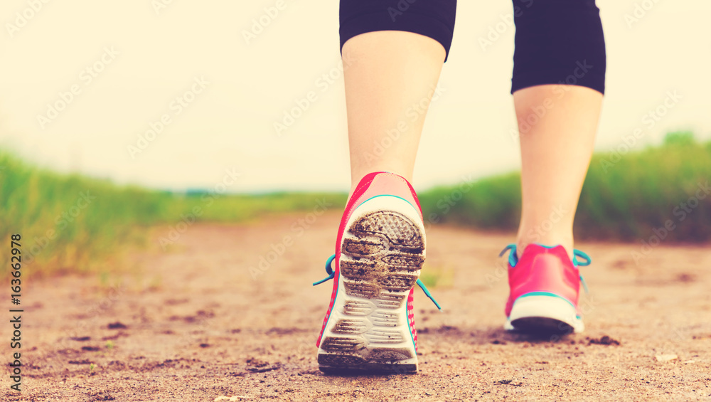 Runner going for a jog at the sand