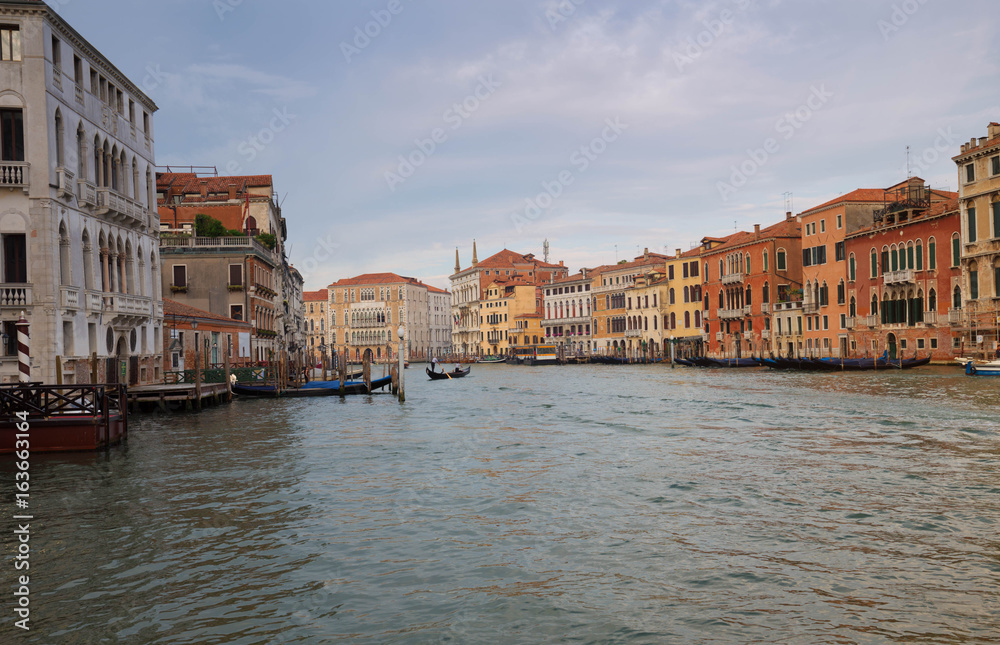 Venice / View of the river and historical architecture.