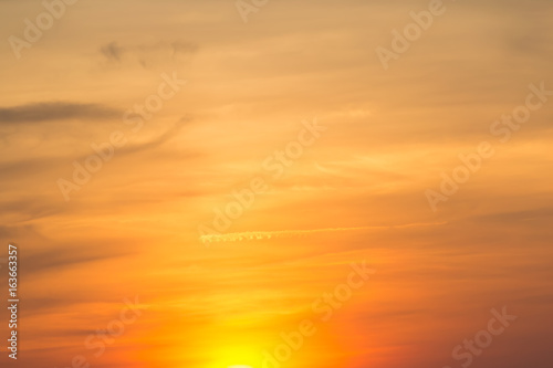 Hot weather, clouds look colorful before sunset. © suwatsilp