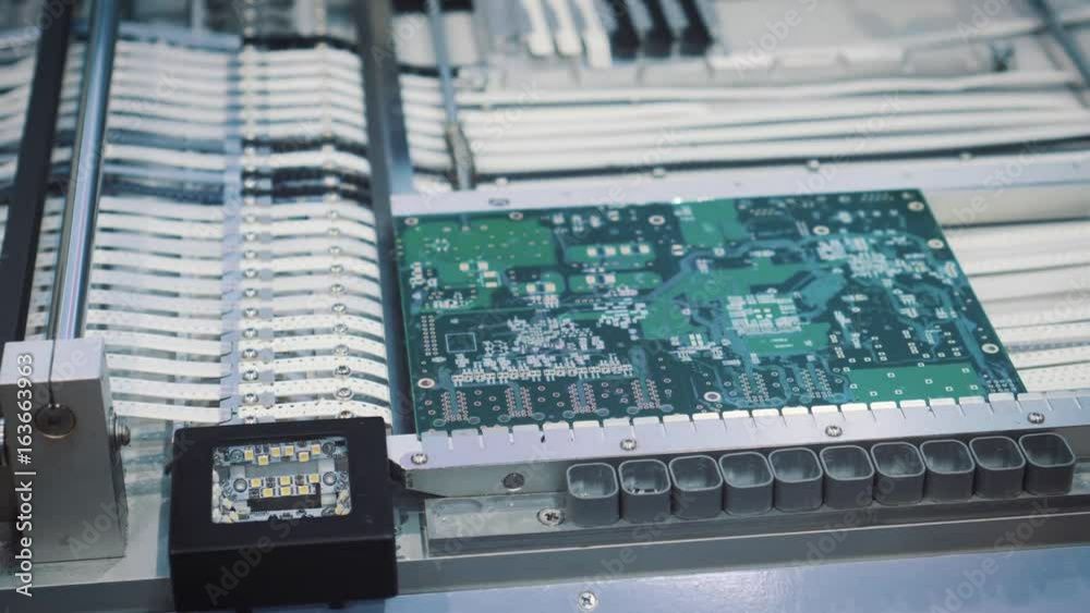 Surface Mount Technology - Smt Machine places elements on circuit boards. Surface Mount Technology - Smt Machine places elements on circuit boards.