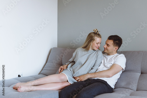 Konstfotografi Beautiful pregnant woman and her handsome husband