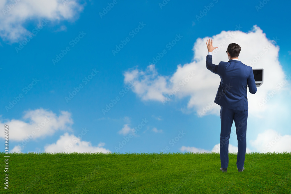 Businessmam pressing virtual buttons in the sky Businessmam pressing virtual buttons in the sky