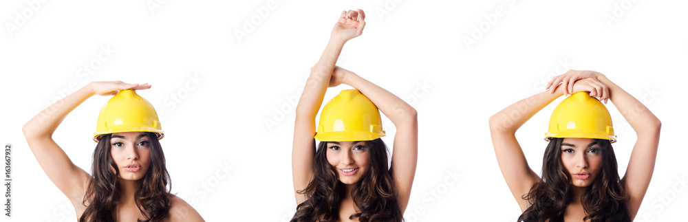 Young woman with yellow hard hat on white Young woman with yellow hard hat on white
