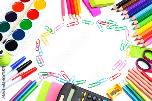 school and office supplies. school background. colored pencils, pen, pains, paper for  school and student education isolated on white background. top view with copy space