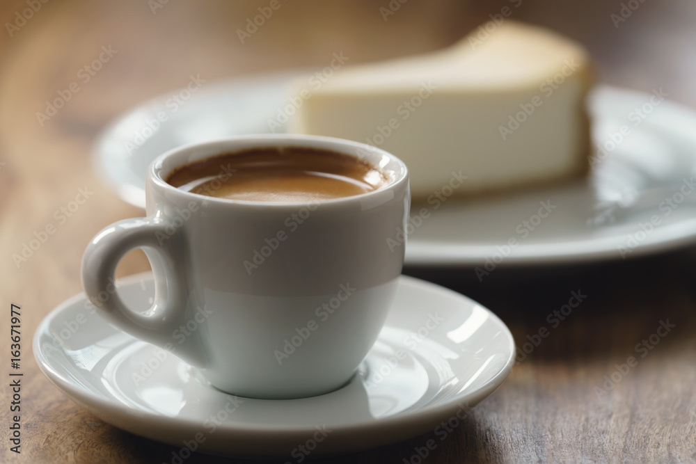 fresh espresso and cheesecake on table fresh espresso and cheesecake on table