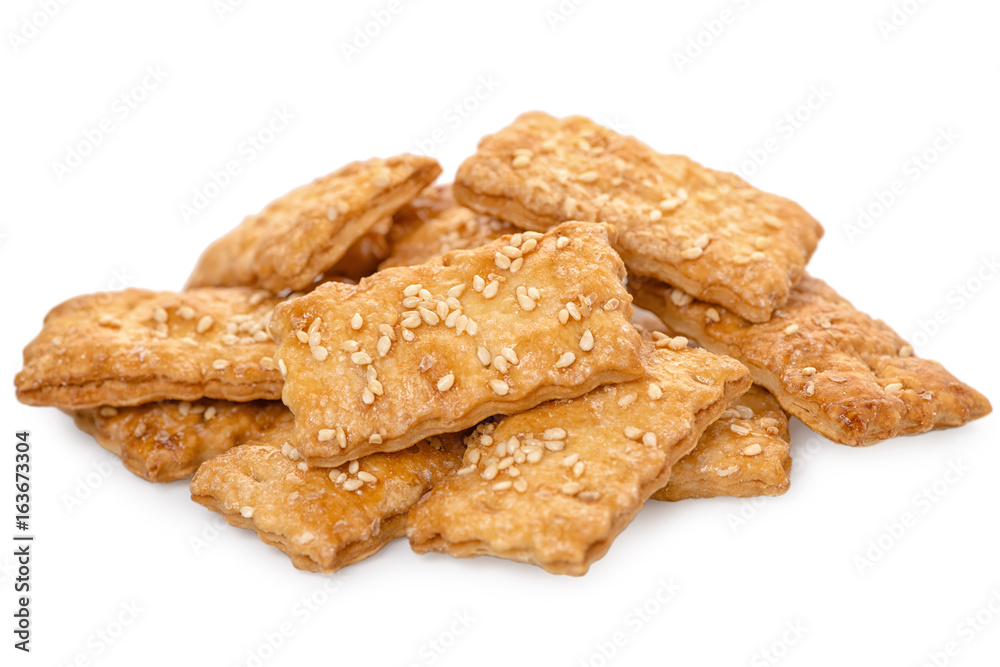 biscuit sweet cookie cracker with sesame isolated on white, close up biscuit sweet cookie cracker with sesame isolated on white, close up
