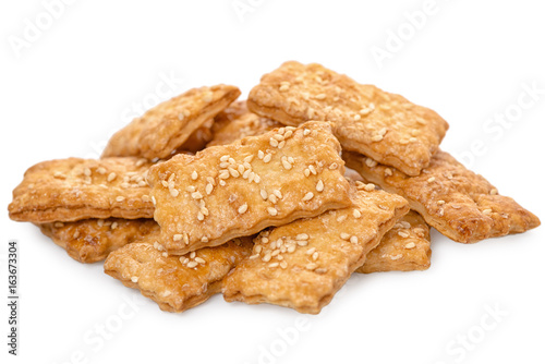 biscuit sweet cookie cracker with sesame isolated on white, close up photo