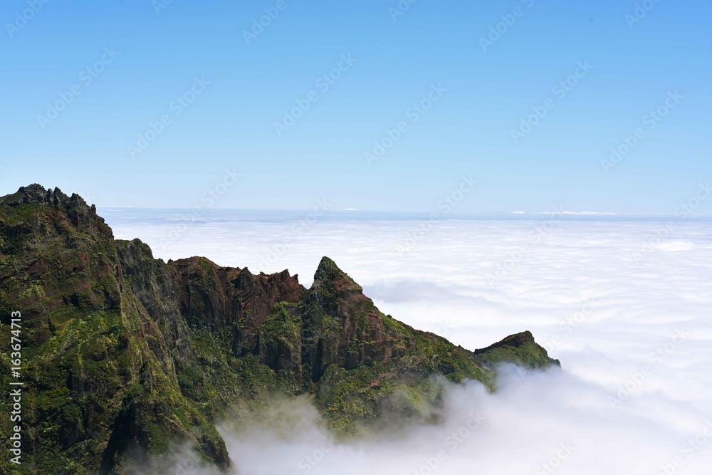 Madeira mountains in clouds.