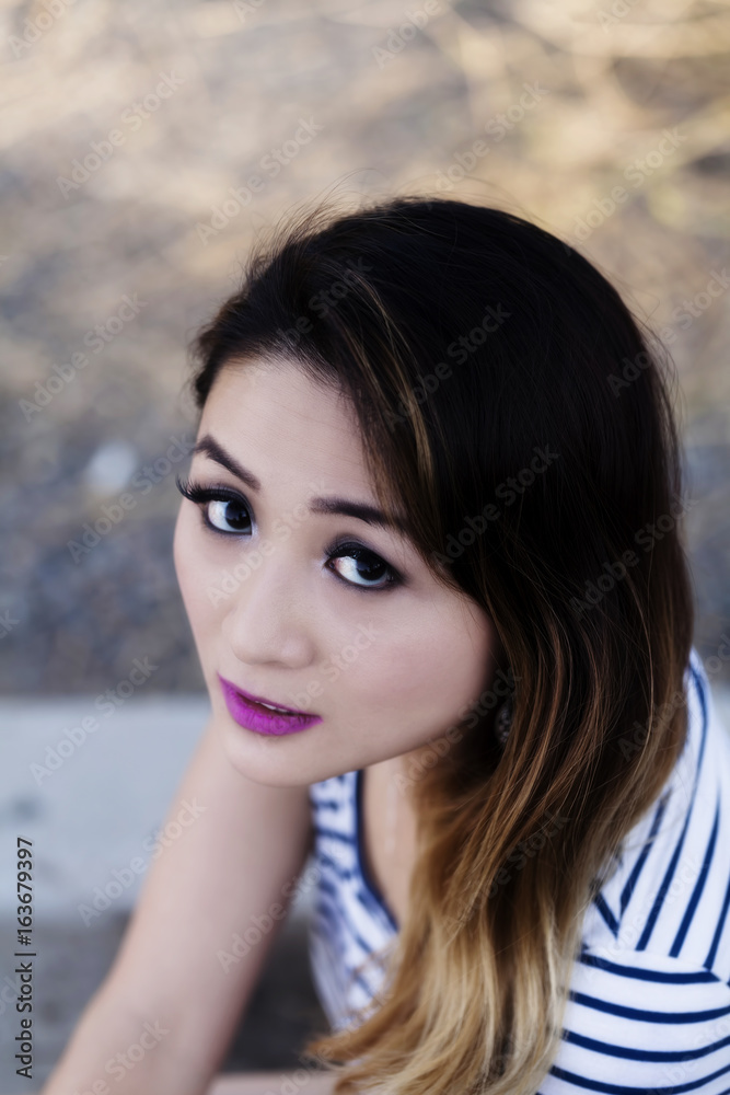 Outdoor Portrait Asian American Woman Looking Up Outdoor Portrait Asian American Woman Looking Up