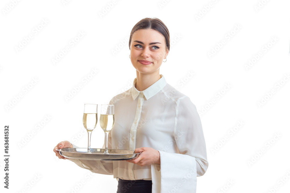 pretty brunette waitress with silver trey in hands pretty brunette waitress with silver trey in hands