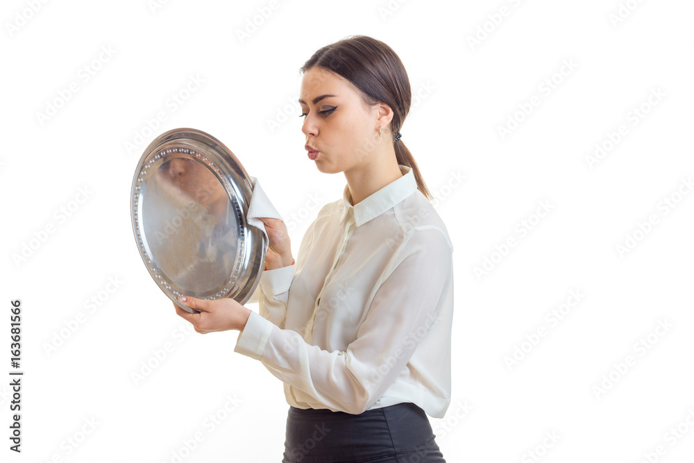 cute brunette waitress with silver trey in hands cute brunette waitress with silver trey in hands