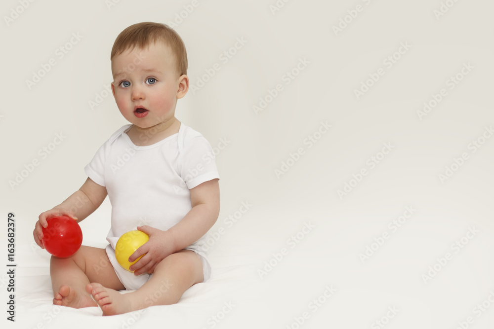 Portrait of a child with blue eyes on a white background Portrait of a child with blue eyes on a white background