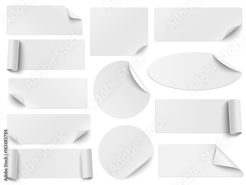 Set of white paper stickers of different shapes with curled corners isolated on white background. Round, oval, square, rectangular shapes. Vector illustration.