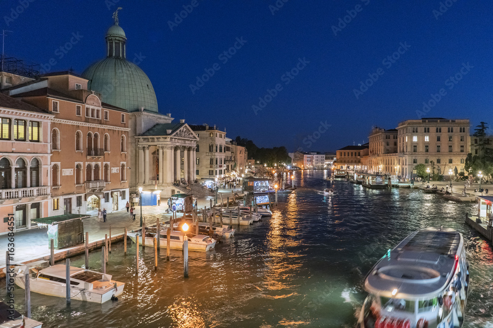 Night view of the Grand Canal in Venice from the bridge called 