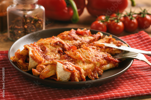 Enchiladas - mexican food, tortilla with chicken, cheese and tomatoes. © O.B.