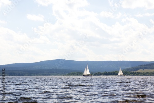 Yachting on lake Lipno in Czech republic.