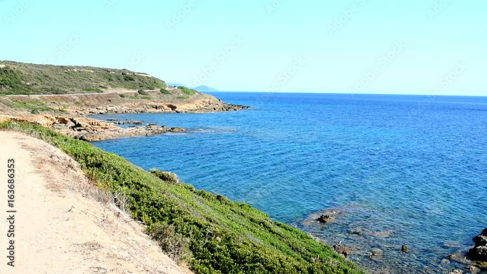 Blue sea in Alghero coastline. Sardinia, Italy Blue sea in Alghero coastline. Sardinia, Italy