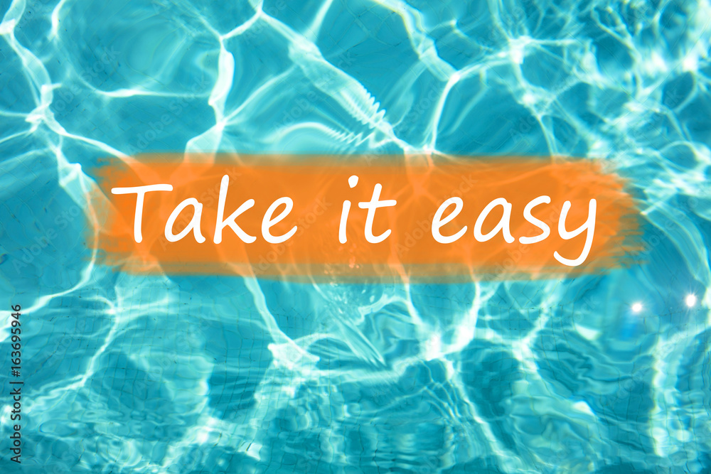 Detal of sentence "Take it easy" on swimming pool water and sun reflecting on the surface - obrazy, fototapety, plakaty 