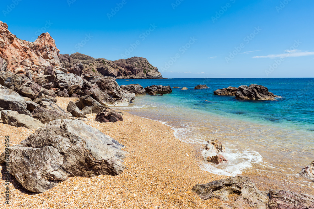 Rock formations on Paleochori Beach located in the south of Milos. Cyclades Islands, Greece.