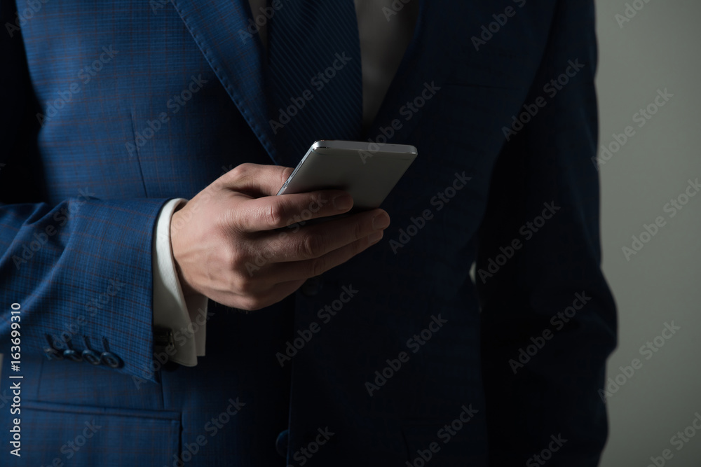 hand holding smartphone hand holding smartphone