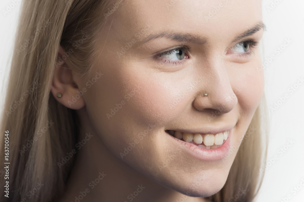 Girl with healthy face skin and teeth