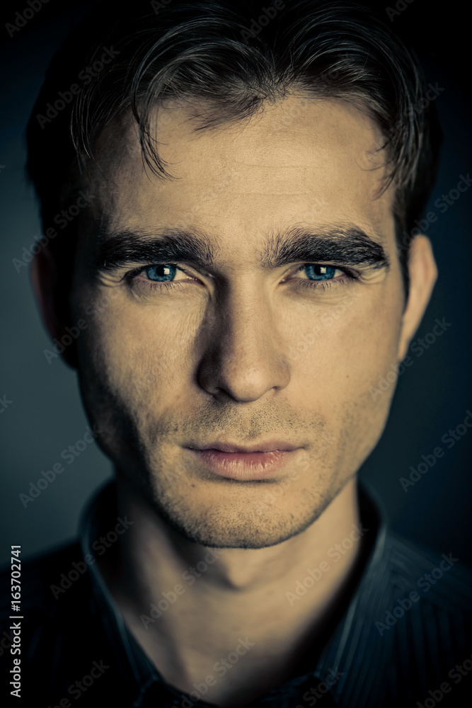 serious male face serious male face