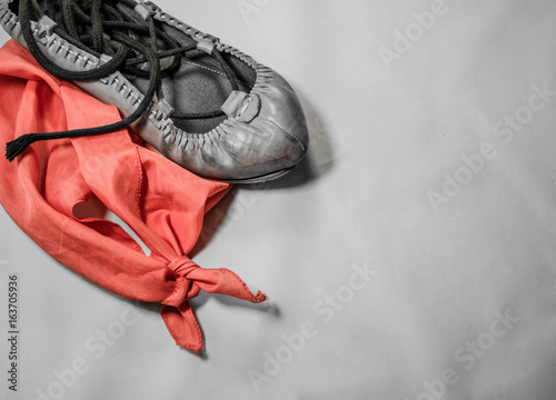 symbol of basque holiday summer festival with red scarf and abarka shoe background photo
