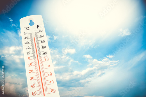 Fototapeta Tropical temperature, measured on an outdoor thermometer, global heat wave, environment concept