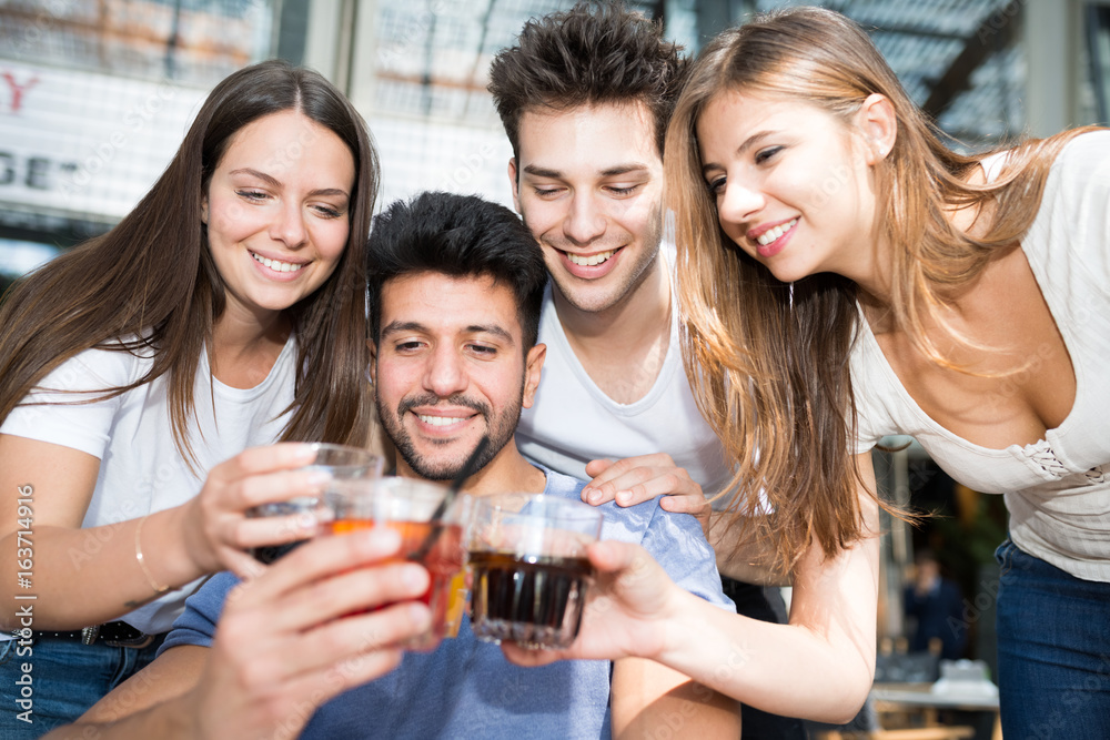 Group of friends toasting drinks Group of friends toasting drinks