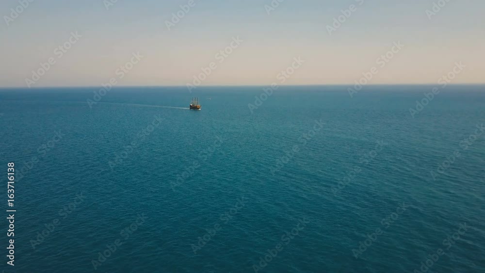 Aerial view of the party boat sailing ship at sea