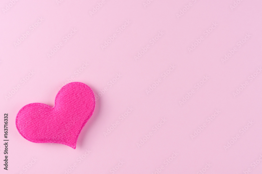 lovely pink heart shape on the pink paper background